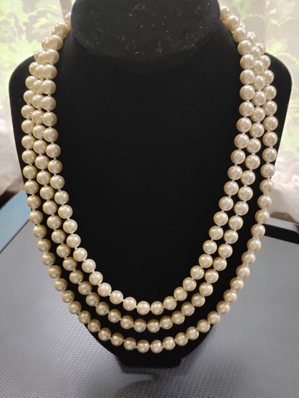 Camrose and Kross Jackie Kennedy three strand faux pearl necklace.